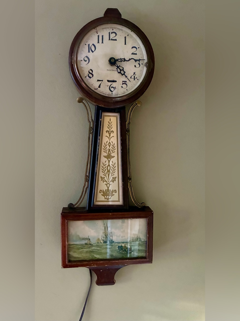 Antique New Haven clock  Wall Clock with Gold Accent Panel and Brown Wood Finish